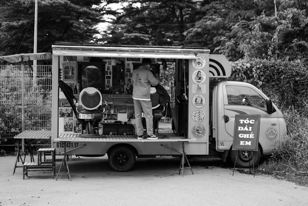 Outside broadcast production van with satellite dish